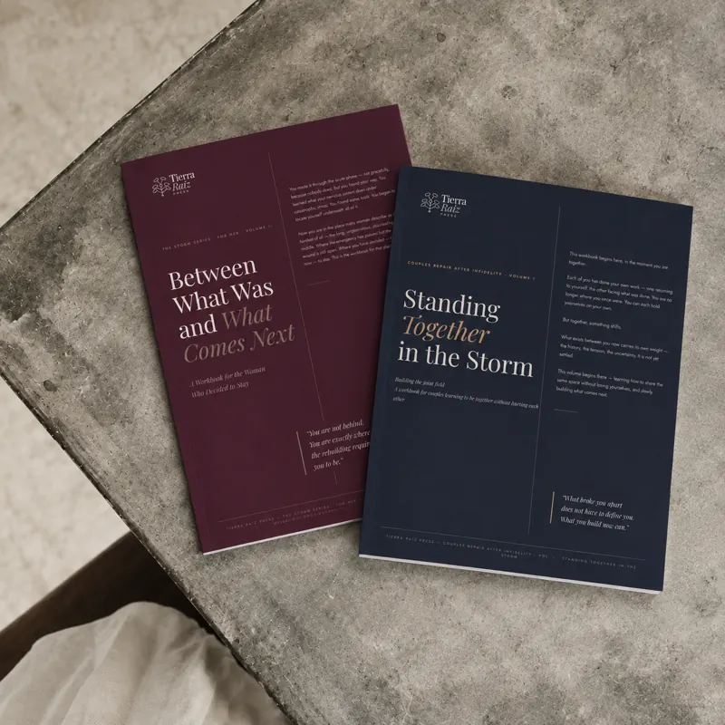 Two Tierra Raíz Press workbooks on a stone surface